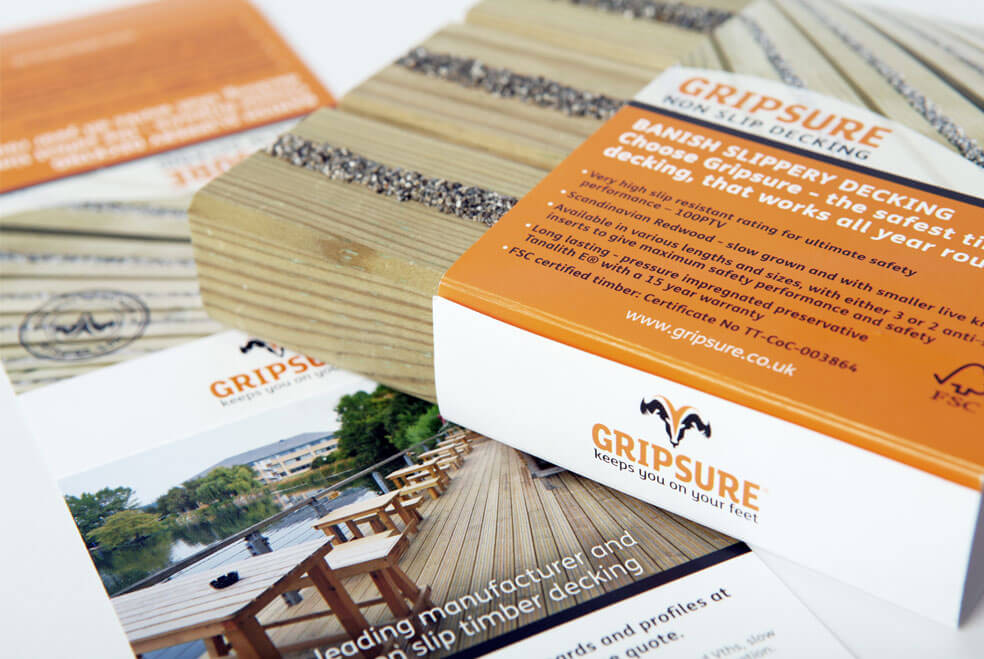 Examples of Gripsure's printed logo, leaflets and packaging that is designed by Oracle design.